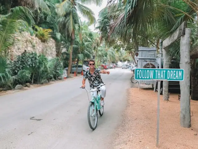A guy riding a bike